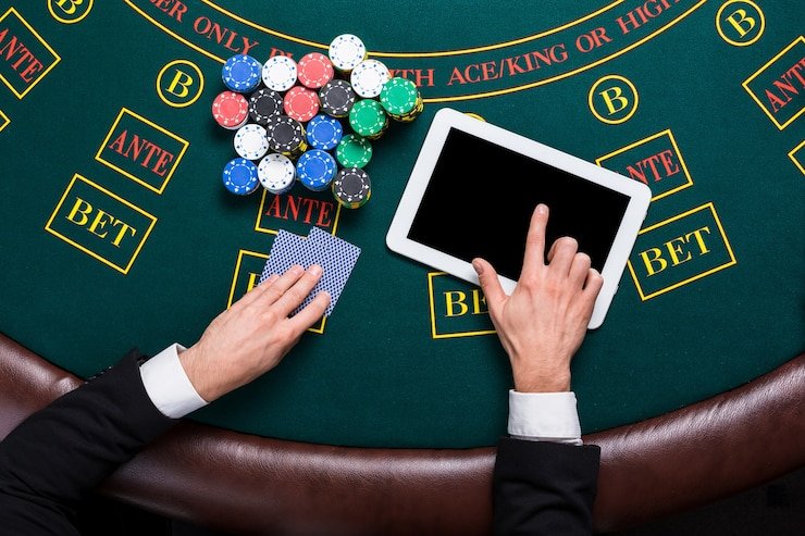 Mobile phone displaying link garuda4d app with football market and live dealer options